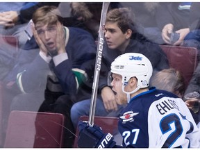 Nikolaj Ehlers celebrates one of his two goals against the Canucks.