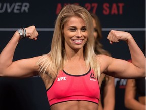 Paige VanZant, of Sacramento, Calif., poses during the weigh-in for a UFC Fight Night event in Vancouver, B.C., on Friday August 26, 2016.