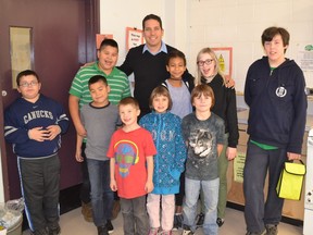 Principal Joe Leibovitch and some of the student volunteers who serve breakfast at his Surrey school for the Attendance Matters program.