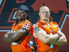 The heart of the B.C. Lions linebackers corps is under threat. Solomon Elimimian, left, could leave the Lions via free agency, and Adam Bighill has a month to see if there are any takers in the NFL.