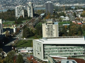 View from the 23rd floor of Surrey Central City Tower in April, showing University Drive, facing New Westminster across from the Fraser River. Surrey City Hall is on the right.
