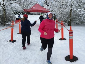 The Abbotsford Resolution Run, one of 10 B.C. Running Room runs held on New Year's Day, had a healthy dump of snow to make the scenic Mill Lake course extra challenging. Close to 150 people signed up for the annual event in the Fraser Valley city.