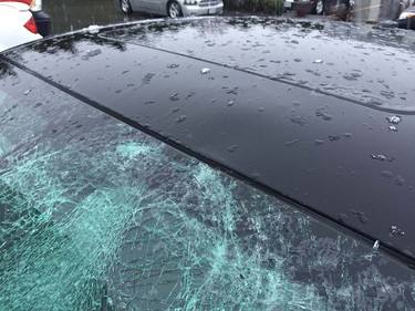 A vehicle damaged by falling snow bombs on the Port Mann Bridge on Monday, Dec. 5, 2016.