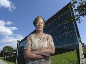 File: President of the Killarney Community Centre Society, Ainslie Kwan outside Vancouver's Killarney Community Centre.