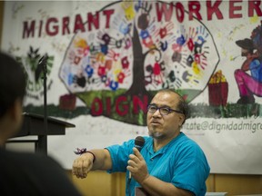 Raul Gatica, executive director of the Migrant Workers association,  speaks at a public meeting in Vancouver Sunday.