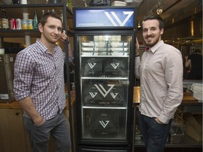 Mack Davis (left) and Braden Matthews are partners in Vital Supply Co., a healthy food delivery service that places branded fridges in businesses filled with their healthy foods. The pair are pictured at their commissary in Vancouver, BC Tuesday, December 13, 2016.