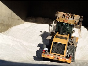 Trucks at the City of Vancouver Works Yard prepare salt for use on freezing roads Wednesday morning.