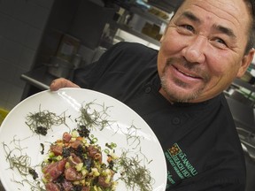 Chef Tom Muromoto of Ka'anapali Beach Hotel, in Maui, makes poke, a chopped sushi salad at Listel Hotel in Vancouver.