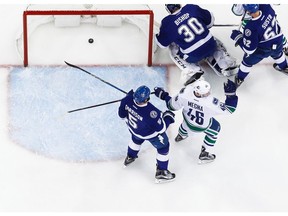 Jayson Megna #46 of the Vancouver Canucks celebrates Erik Gudbranson's goal.