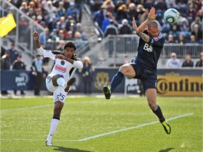 Sheanon Williams in action for the Philadelphia Union against Eric Hassli and the Whitecaps in 2011.