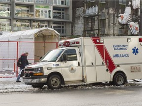 An ambulance is parked outside the mobile medical clinic in the Downtown Eastside.