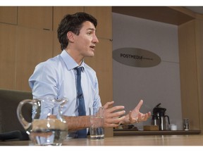 Prime Minister Justin Trudeau gestures while speaking with The Vancouver Sun and Province editorial board in Vancouver, December, 20, 2016.