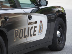 Both the passenger and driver of a pickup were overdosing when they hit a Vancouver police cruiser on Friday.