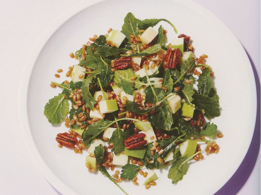 Wheat berry kale salad sweetened by maple syrup and candied pecans