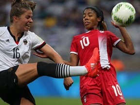 Germany&#039;s Melanie Leupolz, left, kicks the ball past Canada&#039;s Ashley Lawrence during a semifinal match of the women&#039;s Olympic football tournament between Canada and Germany at the Mineirao stadium in Belo Horizonte, Brazil, Tuesday Aug. 16, 2016. Canadian soccer star Lawrence has signed with French club Paris St. Germain. THE CANADIAN PRESS/AP/Eugenio Savio