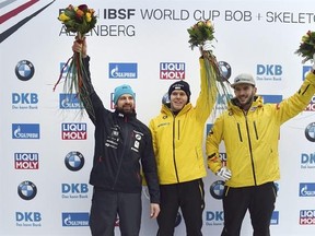 From left : Latvia&#039;s second placed Martins Dukurs, German winner Christopher Grotheer and third placed German Axel Jungk celebrate after the men&#039;s skeleton World Cup race in Altenberg, Germany, Saturday, Jan. 7, 2017. (Arno Burgi/dpa via AP)