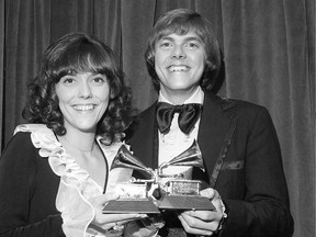 FILE - This March 14, 1972 file photo shows Karen Carpenter, left, and Richard Carpenter, of The Carpenters, posing with their award for best pop vocal per during the 14th annual 1971 Grammy Awards in New York. Richard Carpenter sued Universal Music Group on Wednesday, Jan. 11, 2017, seeking more than $2 million in royalties he says are owed to him and the estate of his late sister for sales of digital music on services such as Apple&#039;s iTunes. The Carpenters won three Grammy Awards, including fo