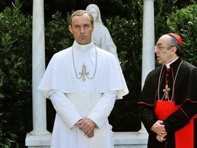 This image released by HBO shows Jude Law, left, and Silvio Orlando from the HBO series, &ampquot;The Young Pope,&ampquot; premiering Sunday at 9 p.m. EST. (Gianni Fiorito/HBO via AP)