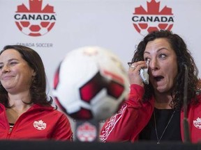 Rhian Wilkinson, left, and Melissa Tancredi of Canada&#039;s women&#039;s soccer team attend a news conference in Vancouver, Friday, Jan. 13, 2017 to announce their retirement from the team. THE CANADIAN PRESS/Jonathan Hayward