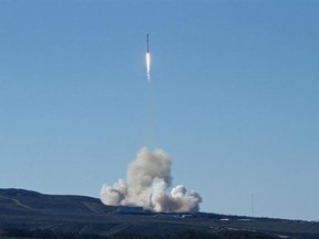 Space-X&#039;s Falcon 9 rocket successfully launches with 10 satellites into orbit for Iridium Communications Inc., at Vandenberg Air Force Base, Calif., Saturday, Jan. 14, 2017. About nine minutes later, the first stage returned to Earth and landed successfully on a barge in the Pacific Ocean south of Vandenberg. The return to flight is an important step for SpaceX, a California-based company that has about 70 launches in line, worth more than $10 billion. (Matt Hartman via AP)