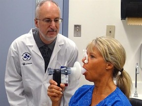 Dr. Shawn Aaron gives a patient a spirometry test in a handout photo. About a third of Canadian adults being treated for asthma don&#039;t actually have the respiratory disorder, either because they have been misdiagnosed or have gone into remission, research suggests. THE CANADIAN PRESS/HO-The Ottawa Hospital MANDATORY CREDIT