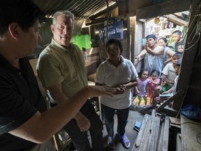 This image released by the Sundance Institute shows Al Gore, second left, in a scene from &ampquot;An Inconvenient Sequel&ampquot; a film by Bonni Cohen and Jon Shenk. The film is an official selection of the Documentary Premieres program at the 2017 Sundance Film Festival. (Sundance Institute via AP)
