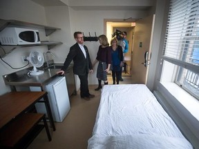 (From left) B.C. Health Minister Terry Lake,  Bonnie Wilson of Vancouver Coastal Health and MLA Jane Thornthwaite tour a new substance-use treatment unit for women in Vancouver's Rice Block at 800 East Hastings Street.