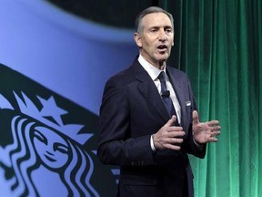 FILE- In this Dec. 7, 2016, file photo, Starbucks Chairman and CEO Howard Schultz speaks during the Starbucks 2016 Investor Day meeting in New York. Starbucks says it will hire 10,000 refugees over the next five years, a response to President Donald Trump&#039;s indefinite suspension of Syrian refugees and temporary travel bans that apply to six other Muslim-majority nations. Schultz said in a letter to employees Sunday, Jan. 29, 2017, that the hiring would apply to stores worldwide. (AP Photo/Richar