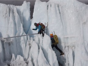 A pair of Sherpa on the Khumbu Icefall on Mount Everest, in a scene from the documentary Sherpa, by Jennifer Peedom.