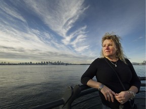 Sherri Thomson on the North Vancouver waterfront last week. Thomson, who was sexually abused by her stepfather when she was a child, is now being sued by her mother and stepfather for defying the terms of a 21-year-old settlement agreement requiring Thomson to keep quiet about the abuse she suffered.