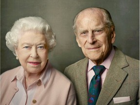 A handout portrait photograph released by Buckingham Palace on June 9, 2016 and taken by Annie Leibovitz to mark the Queen's 90th birthday shows Britain's Queen Elizabeth II (L) and Prince Philip, Duke of Edinburgh (R) pictured at Windsor Castle just after Easter in 2016.