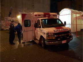 An ambulance delivers a patient to a mobile emergency facility in the Downtown Eastside. The tent, staffed by emergency and addictions physicians, was set up last month to help tackle the fentanyl crisis.