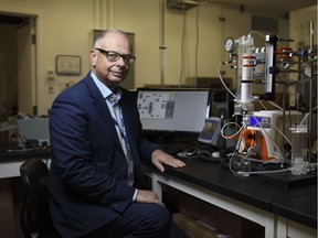 Carlo Montemagno is pictured with a foam bioreactor for carbon capture, in Edmonton on Friday January 6, 2016. Ingenuity Lab director Montemagno has engineered a new way to capture CO2 from industrial gas emissions. His technology harnesses photosynthesis, the process plants use to convert carbon dioxide into chemical energy using light.