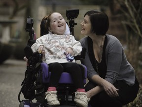 Charlie-Anne Cox  7, with her Mum Cherie (Ehlert) outside of  Canuck Place in Vancouver.