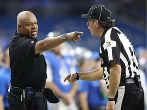 DETROIT, MI - DECEMBER 11: Detroit Lions head football coach Jim Caldwell argues with field judge Scott Edwards #3 during the second quarter of the game against the Chicago Bears at Ford Field on December 11, 2016 in Detroit, Michigan.
