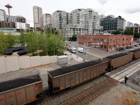 A train hauling coal to B.C. heads north out of Seattle.