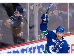 Henrik Sedin celebrates his goal against the Nashville Predators.