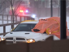 A passing motorist called police around 1:30 p.m. Wednesday after spotting two bodies inside a white Dodge Ram with British Columbian licence plates near 39 Street SW and Charlesworth Drive SW.