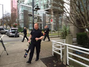 Photos from an incident involving Vancouver Police this morning at Nicola and Hastings Streets. A man  from an apartment building was taken into custody by officers.