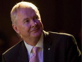 Former Vancouver Olympics CEO John Furlong received a standing ovation at a University of British Columbia fundraiser Tuesday while a handful of protesters gathered outside to draw attention to abuse allegations against him.