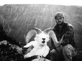 A 1999 photo of Kamloops hunter and guide Abe Dougan purportedly taken moments after bagging a record-setting Dall sheep.