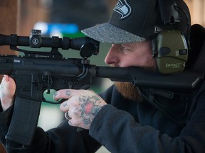 Competitive shooter Graeme Foote, who was born without a right hand, shoots with an AR-15 rifle at a range in Abbotsford, B.C., on Sunday January 15, 2017. Graeme Foote, who was born without most of his right hand, is a rising talent in precision-rifle shooting. The Surrey, British Columbia native took up the sport competitively only three years ago and other shooters say he has already overtaken many marksmen with far longer track records and double the digits. THE CANADIAN PRESS/Darryl Dyck