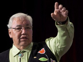 Truth and Reconciliation Commission chairman Justice Murray Sinclair shown speaking during the grand entry ceremony for the commission in Ottawa on June 1, 2015. — The Canadian Press files