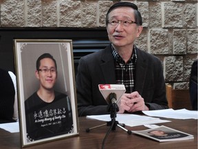 Bill Chu talks about the death of diver Timothy Chu (in framed photograph) on Monday in Richmond. The family, which reviewed a BC Coroners Service report on Timothy Chu’s death that was released in November, wants to see tougher regulation of the sport.