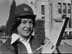 City of Vancouver meter-maid Lynn Watts with her ticket book at Vancouver City Hall in 1976. Ian Lindsay/PNG files