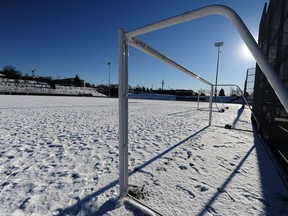 Empire Field sits under a blanket of snow as cold and snowy conditions close soccer fields across the city, delaying the start of the amateur and youth soccer seasons.