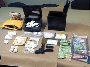 Some of the drugs and cash seized by Abbotsford police in May 2016 that led to dozens of charges being laid against Corey Jim Perkins.