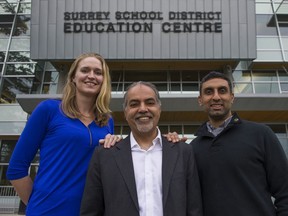 Barj Dhahan (centre), founder and president of the Sandhurst Group, with Sarah McKay (left), youth diversity liaison at the Surrey School District, and Sukh Shergill, manager of the Safe Schools program.