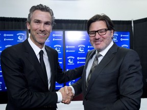 Linden and Aquilini, the day the former captain was hired by the Canucks.