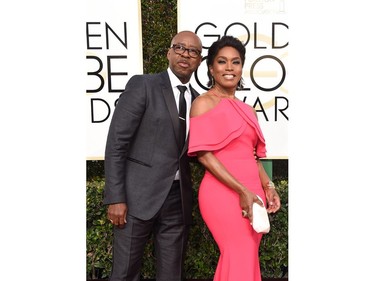 Actors Courtney B. Vance and Angela Bassett arrive at the 74th annual Golden Globe Awards.